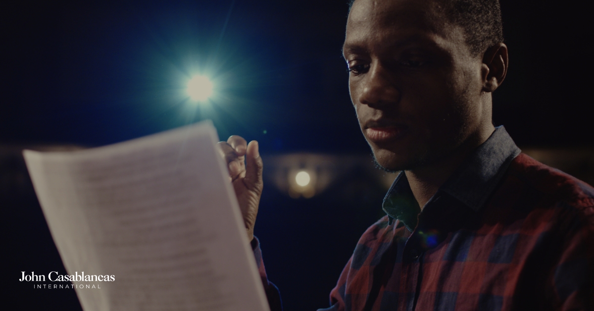 actor looking at a script in preparation for a performance